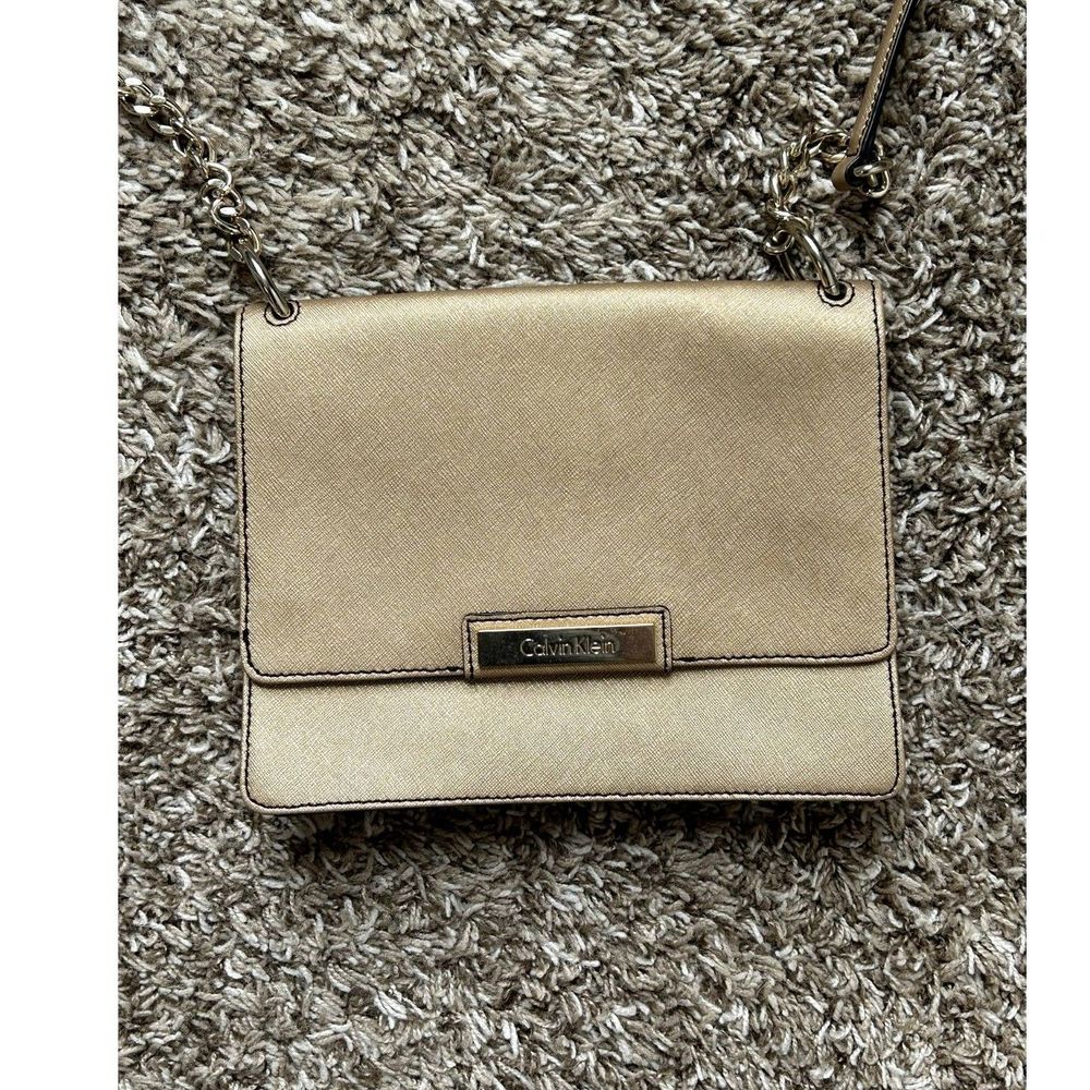 Calvin Klein Champagne Gold tone Crossbody Handbag